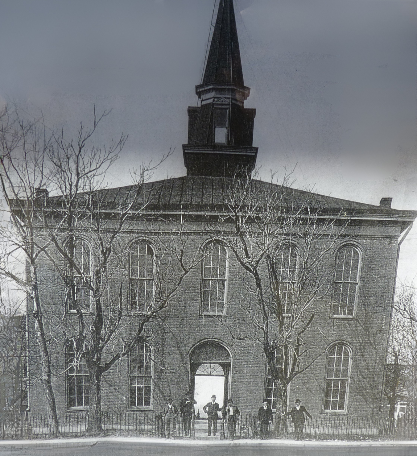 A historical black-and-white photograph of the second Stoddard County Courthouse in Bloomfield, Missouri, as it appeared between 1870 and 1909 before the clock tower was added.